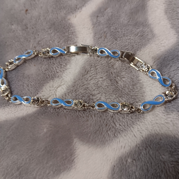 Blue enamel and crystal infinity bracelet. - Picture 1 of 14